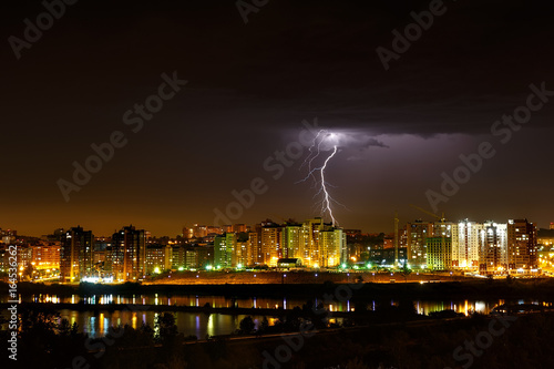 Lightning in the sky with cityscape