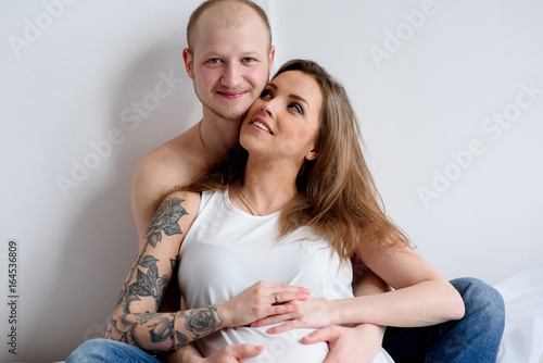 Happy married couple waiting for the birth of a child. Pregnancy. photo