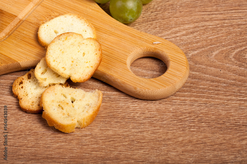 Fototapeta premium Cheese apetizer on wooden background. Rustic food