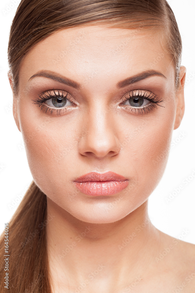 Beautiful model with natural make-up on white background. Studio photo Beautiful model with natural make-up on white background. Studio photo