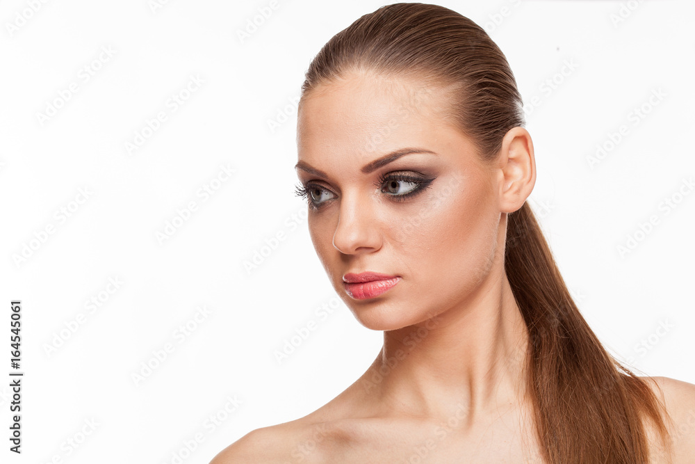 Blonde model with professional make up on white background Blonde model with professional make up on white background