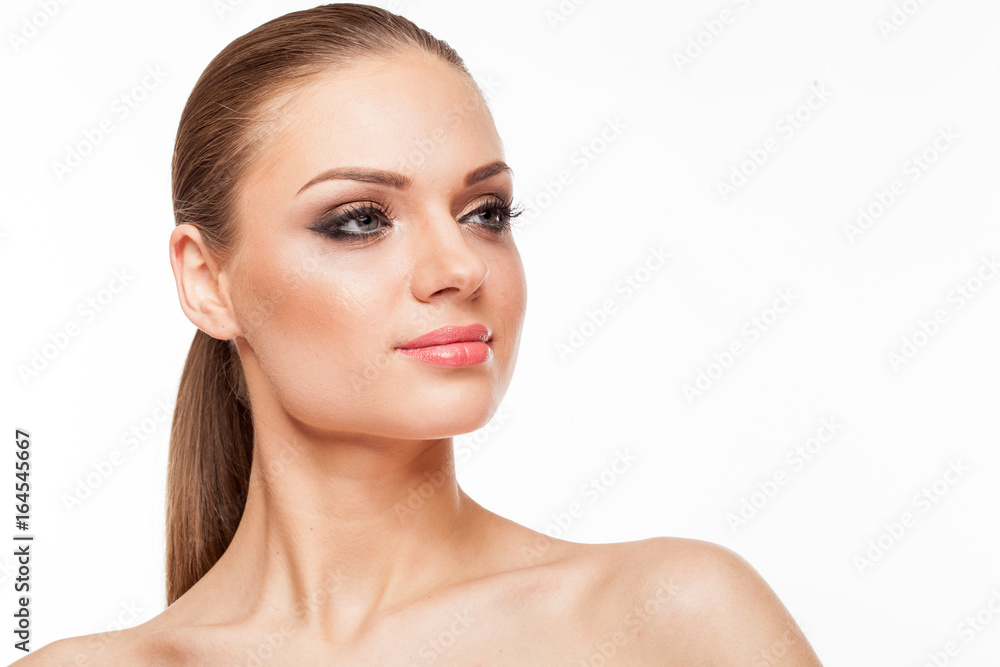 Fototapeta premium Blonde model with professional make up on white background