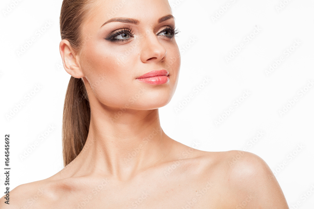 Blonde model with professional make up on white background Blonde model with professional make up on white background