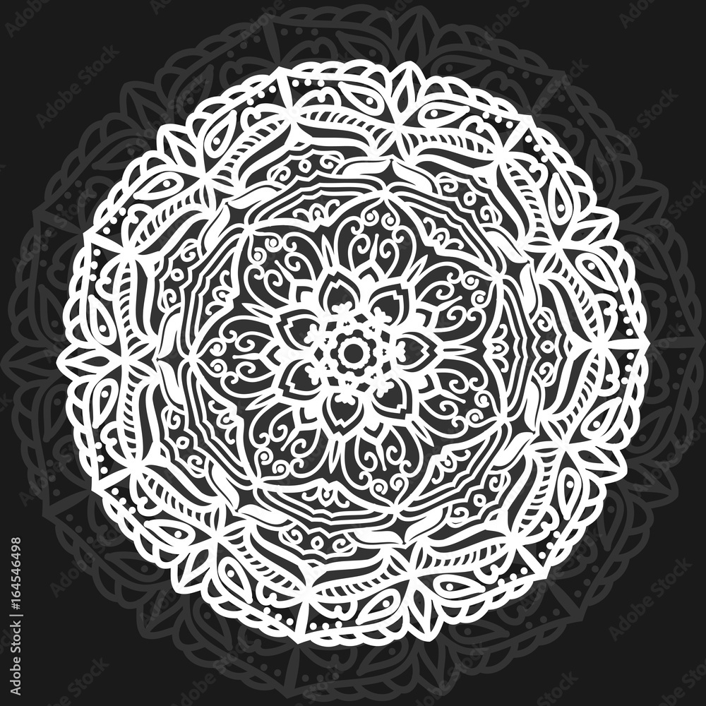 White round mandala of lines on black background
