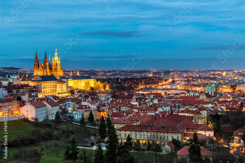Prague, Czech Republic. Hradcany (Prague Castle) with St. Vitus Cathedral and St. George church evening dusk, Bohemia landmark in Praha. © daliu