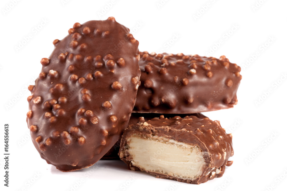chocolate candy with white filling isolated on white background chocolate candy with white filling isolated on white background