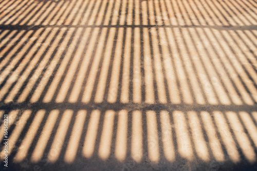 Abstract background of a white wall with Blind shadow from the window