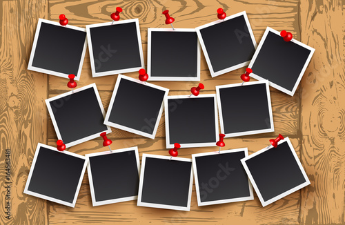 Background of realistic photo frames with red pins on wooden texture. Template retro photo design. Vector illustration