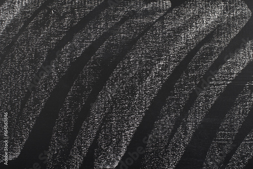 Abstract background of white chalk on blackboard.