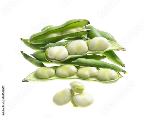 broad beans   pods and grains on an isolated white background