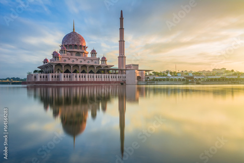 Reflection of Putra Mosque, Putrajaya Malaysia during sunrise photo