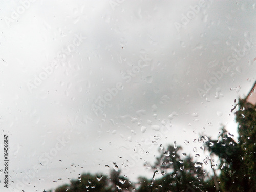 rain on glass under gray cloudy