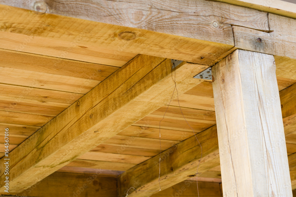 fragment of hardwood roof construction