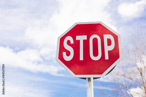 road sign stop on a sky background