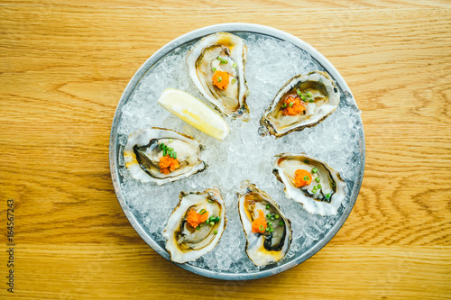 Raw and fresh oyster shell with lemon