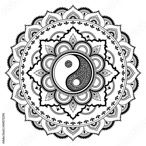 Circular pattern in the form of a mandala.  Yin-yang decorative symbol. Mehndi style. Decorative pattern in oriental style. Coloring book page.