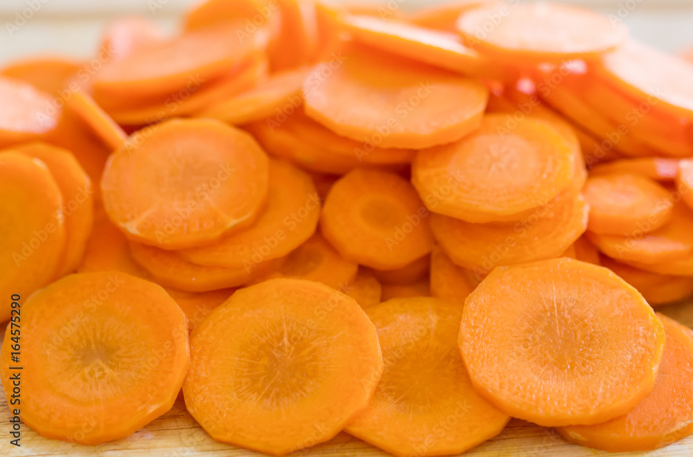 Fresh carrot, cut slices background, Carrot peeled. Fresh carrot, cut slices background, Carrot peeled.