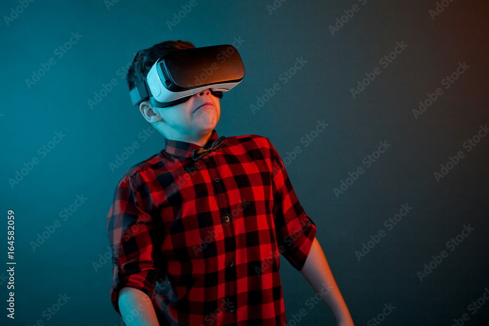 Scared kid in VR glasses Scared kid in VR glasses