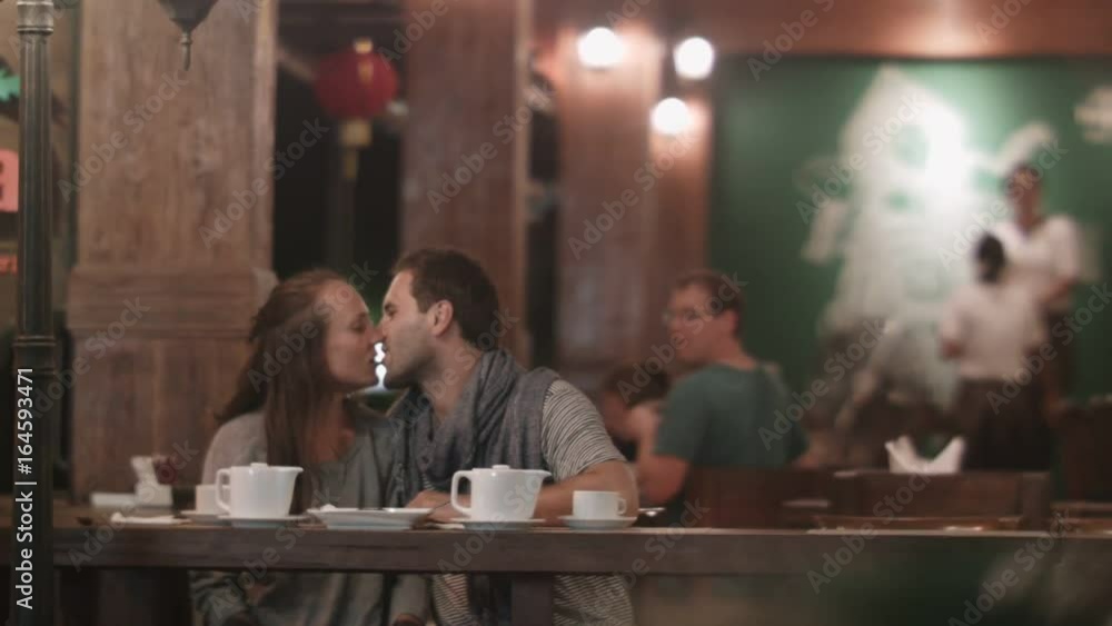 Loving couple sitting in cafe Loving couple sitting in cafe