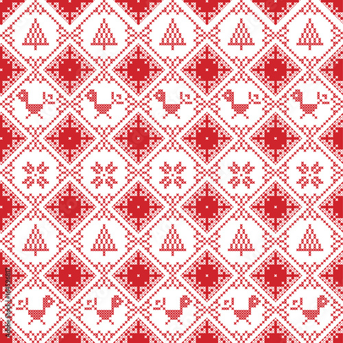 Scandinavian seamless cross stitch inspired Nordic style Christmas pattern in cross stitch with robin, snowflake, star, decorative ornaments in red and white 
