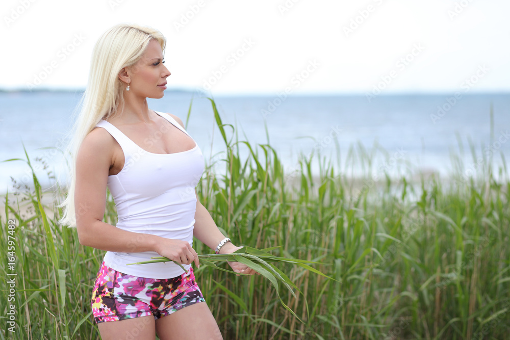 girl in a white T-shirt with big breasts Stock Photo
