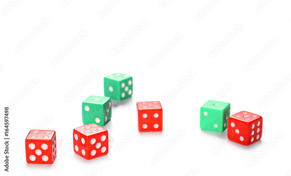 Red and green gambling dice isolated on white background Red and green gambling dice isolated on white background