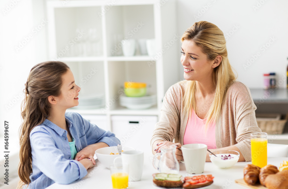 happy family having breakfast at home kitchen happy family having breakfast at home kitchen