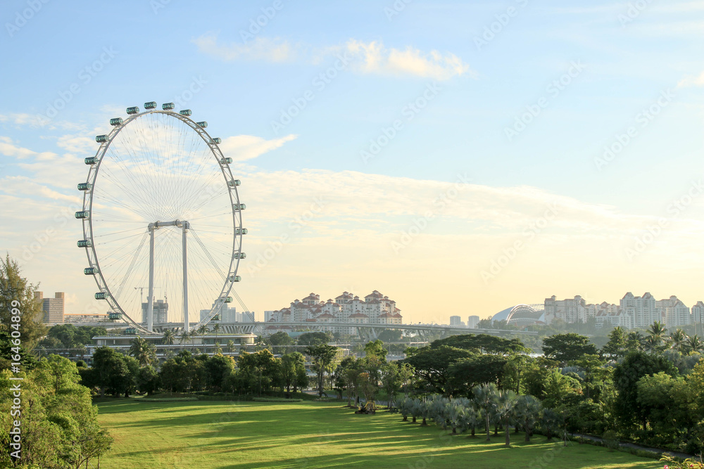 Singapore - JULY 10, 2017 : Singapore Flyer at morning - the Largest Ferris Wheel in the World. Singapore - JULY 10, 2017 : Singapore Flyer at morning - the Largest Ferris Wheel in the World.