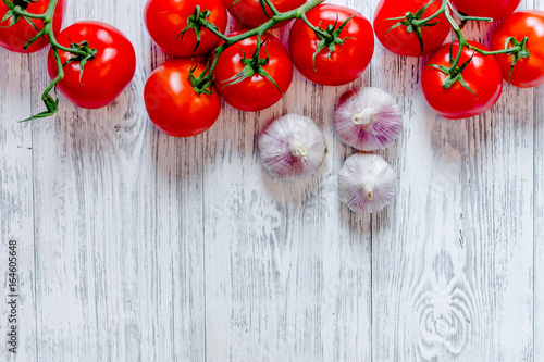 Prepring for cooking dinner. Vegetables on wooden table background top view copyspace photo