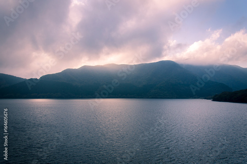 Scenic view of foggy and cloudy lake Ashi  Mount Fuji Area  Hakone  Japan