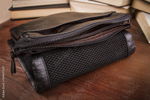 Men's bag with open zipper close-up © Inna