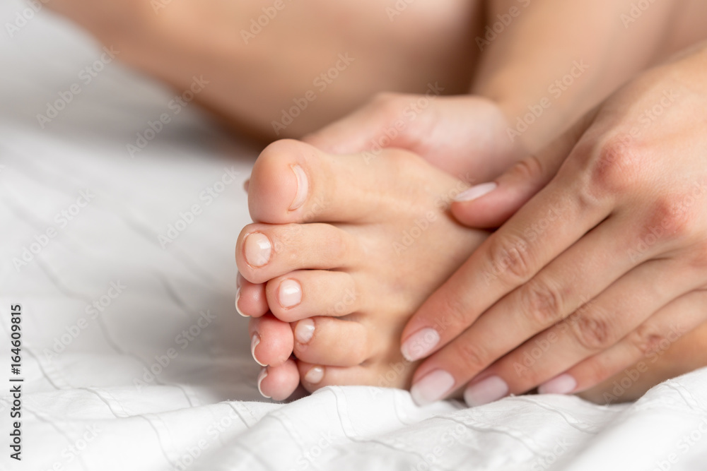 perfect and beautiful woman legs on bed perfect and beautiful woman legs on bed