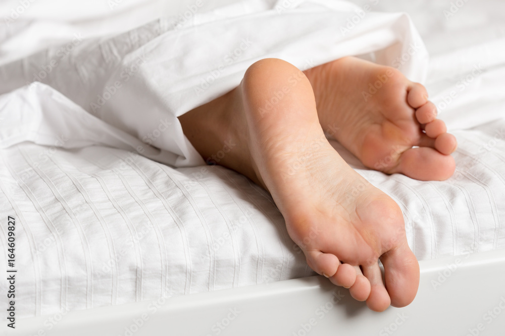 perfect and beautiful woman legs on bed perfect and beautiful woman legs on bed