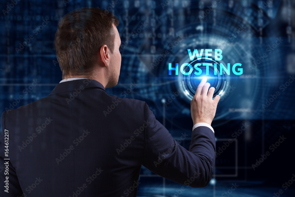 Business, Technology, Internet and network concept. Young businessman working on a virtual screen of the future and sees the inscription: Web hosting Business, Technology, Internet and network concept. Young businessman working on a virtual screen of the future and sees the inscription: Web hosting
