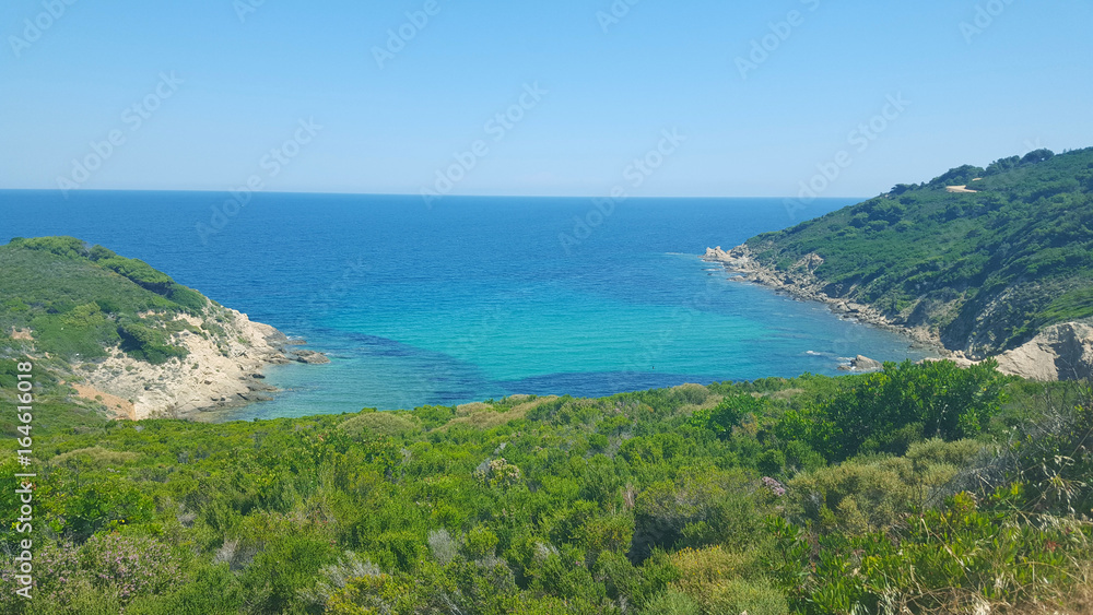 Beautiful beach on Skiathos island in Greece, windy summer day in June
