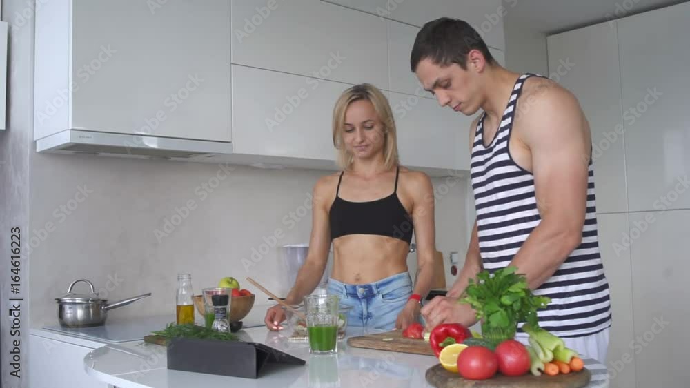 Young couple preparing a healthy Breakfast Young couple preparing a healthy Breakfast