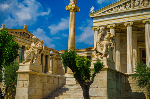 Marble statues of ancient Greek philosophers Socrates and Plato.