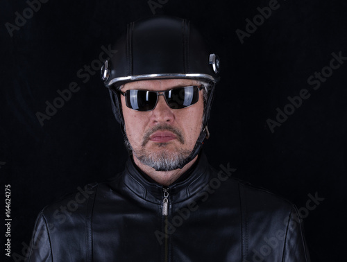 Portrait of a man in a motorcycle helmet
