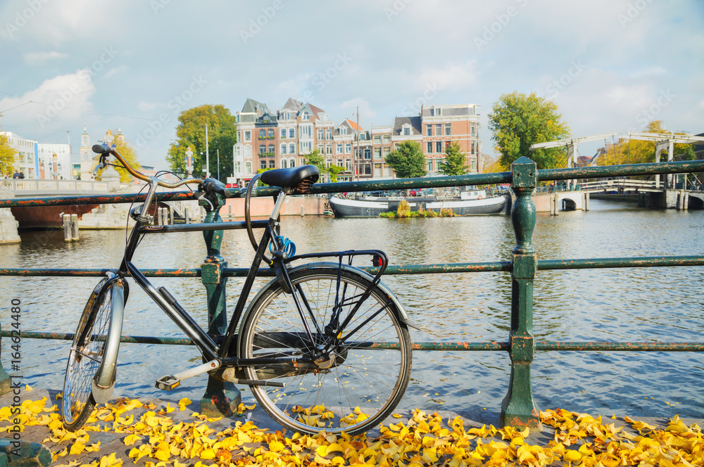 Bycicle parked at the bridge
