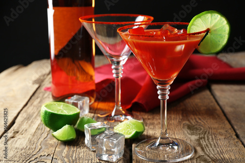 Delicious cocktails with tequila on table photo