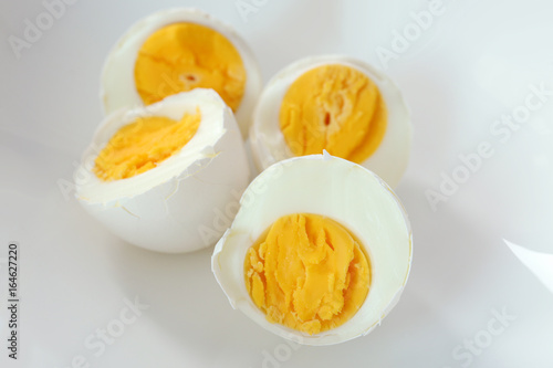 Tasty hard boiled egg, closeup. Nutrition concept