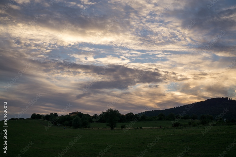 Colorful sunset on meadow. Slovakia