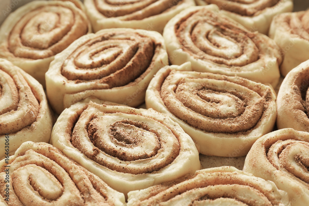 Raw cinnamon rolls, closeup Raw cinnamon rolls, closeup