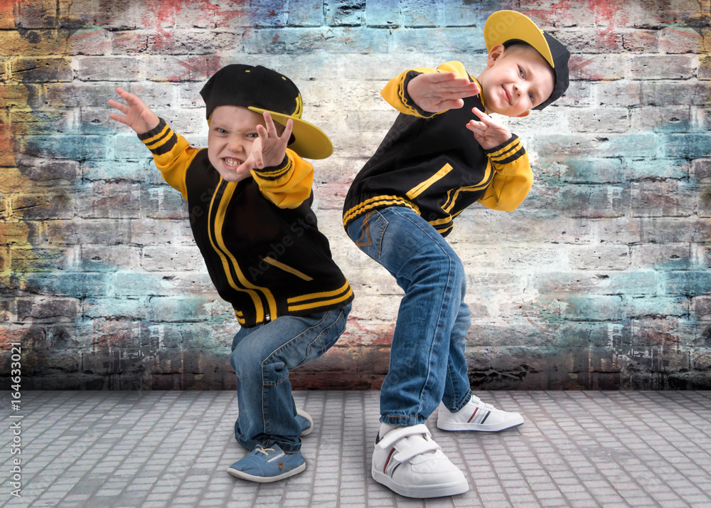Two brothers dancing break dance.Hip-hop style.The cool kids. Stock