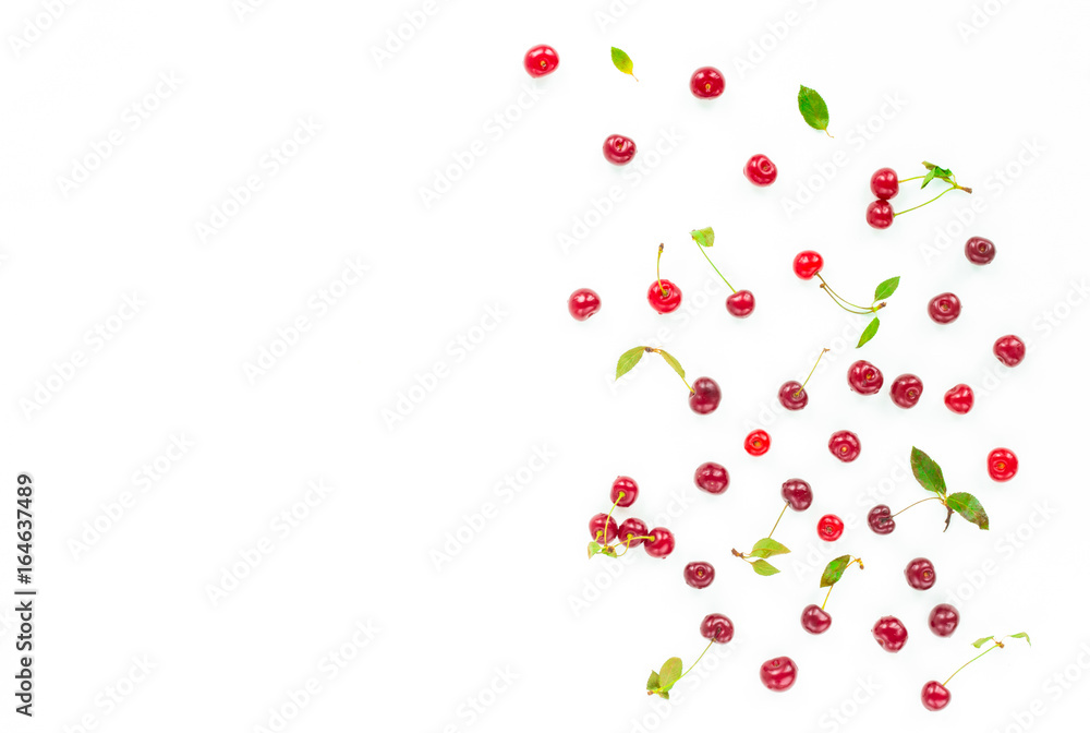 Fruit composition. Fresh cherry on white background. Flat lay, top view