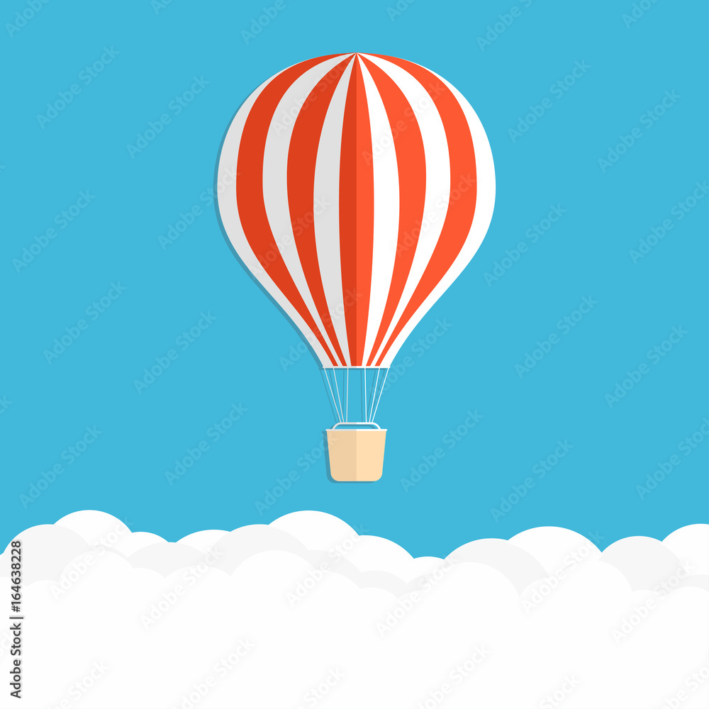 Fototapeta premium Hot air balloon in the sky. Red striped air balloon above clouds