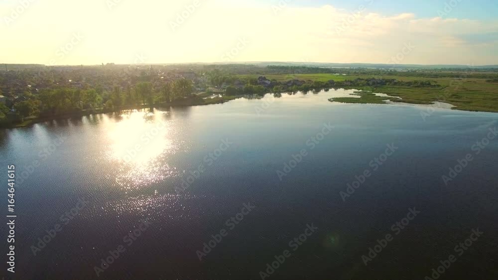 Aerial shot of a beautiful lake, Morning glow, pristine nature Aerial shot of a beautiful lake, Morning glow, pristine nature