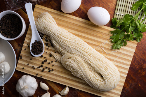 Chinese vermicelli with additional ingredients for cooking photo