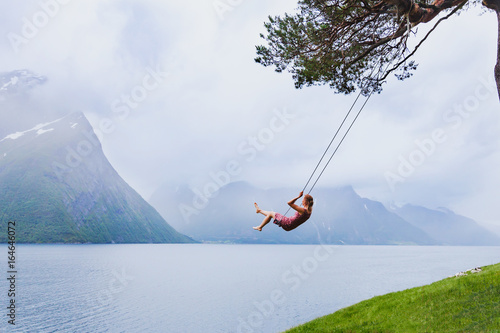 romantic girl on the swing, sweet dreams, daydream concept background photo