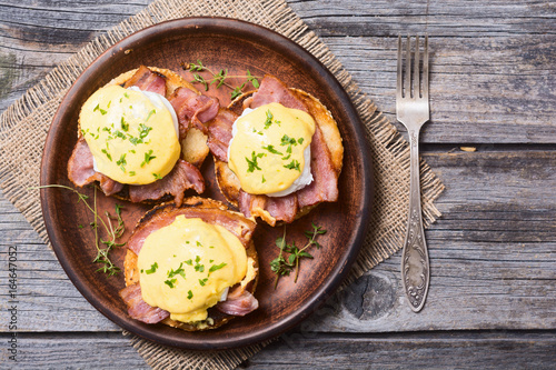 Vászonkép Eggs benedict with bacon